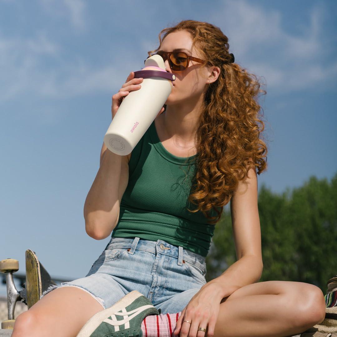 imageOwala FreeSip Sway Insulated Stainless Steel Water Bottle with TwoWay Spout BuiltIn Straw and Bucket Handle Made for Travel School and Sports 40oz BPA Free Leak Proof Foggy TideDaybreak