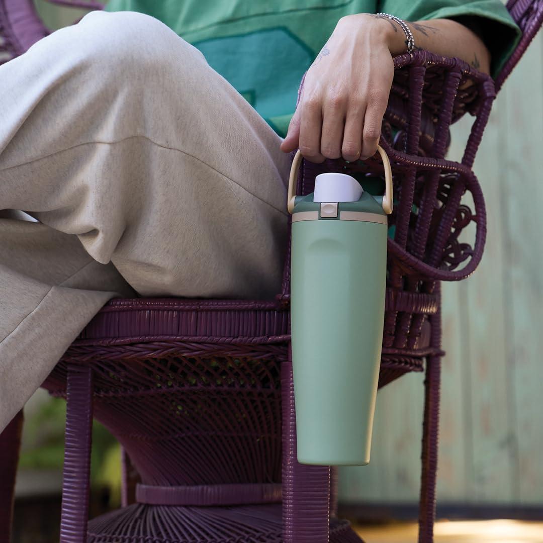 imageOwala FreeSip Sway Insulated Stainless Steel Water Bottle with TwoWay Spout BuiltIn Straw and Bucket Handle Made for Travel School and Sports 40oz BPA Free Leak Proof Foggy TideEucalyptus